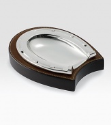 Cast in a horseshoe shape, this essential trinket tray is a rustic yet refined addition to the well-appointed desk. 5½W X 6LSilverplated brass and saddle leatherImported