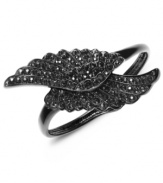 Fly at night with this mysterious bracelet from Bar III. The wing silhouette is embellished with glass stones. Crafted in jet tone mixed metal. Approximate length: 7-1/4 inches.