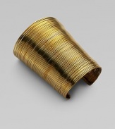 Totally simple and totally fabulous, this stunning open cuff, worthy of an ancient Egyptian princess, is gracefully formed of delicate brass wires with a polished finish.BrassDiameter, about 2½Length, about 4¼Imported