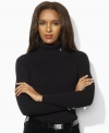 Knit for a feminine fit in soft ribbed cotton, this versatile petite Lauren by Ralph Lauren turtleneck is a chic seasonal essential. (Clearance)