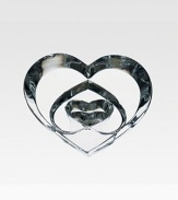 A heart-within-a-heart design handcrafted in France from weighty crystal. 3¾W X 2H Wipe clean Handmade in France 