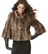A vintage-inspired silhouette and luxe faux fur combine to create INC's wildly chic topper.