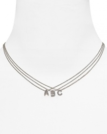 A glittering sterling silver initial pendant necklace from Crislu. A glittering sterling silver initial pendant necklace from Crislu.