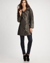 A water-repellent style with a hidden hood. Pleated, double-layer point collarSnap frontLong sleevesButtoned cuffsSlash pocketsAbout 34 from shoulder to hemFully linedWater-repellent polyester shell; Thermore® polyester fillDry cleanImportedEasy fit. Choose smaller size if between sizes Zone 2: Suggested for temperatures from low 40s to mid 50s FahrenheitModel shown is 5'9½ (176cm) wearing US size Extra Small 
