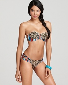 In a wild cheetah print, this Mara Hoffman bikini boasts an exotic look with a sporty touch--a provocative silhouette flaunts the figure. In a wild cheetah print, this Mara Hoffman bikini boasts an exotic look with a sporty touch--a provocative silhouette flaunts the figure.