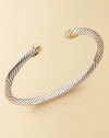 From The Cable Kids Collection. A charming sterling silver cable with opal end caps set in 18k gold. Opal Sterling silver and 18k yellow gold Cable, 4mm Diameter, about 2 Made in USA