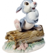 Bambi's pal, Thumper, lifts a foot to perform his signature thump-on-a-log move in this handcrafted porcelain figurine from Nao by Lladro.