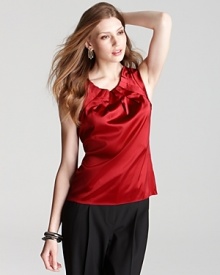 A knife pleated neckline adds texture to the Elie Tahari Winona top, the perfectly effortless blouse that you'll reach for time and time again. A knife pleated neckline adds texture to the Elie Tahari Winona top, the perfectly effortless blouse that you'll reach for time and time again.
