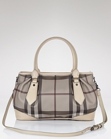 Elegance is easy with this classic checked tote from Burberry. Take it to work and out to weekend brunch. Elegance is easy with this classic checked tote from Burberry. Take it to work and out to weekend brunch.