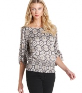 The  regal baroque-inspired print on this MICHAEL Michael Kors' petite peasant top is sure to grab some serious attention!