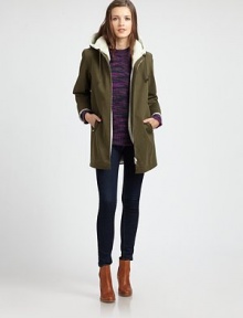 Cleverly designed parka has plush faux shearling trim and an attached hood for cool days ahead. Faux shearling-trim hoodLong sleevesFront zipperZippered slash pocketsAbout 30 from shoulder to hemBody: CottonFaux shearling liningDry cleanImported of Italian fabricModel shown is 5'10 (177cm) wearing US size Small. Cleverly designed parka has plush faux shearling trim and an attached hood for cool days ahead. Faux shearling-trim hoodLong sleevesFront zipperZippered slash pocketsAbout 30 from shoulder to hemBody: CottonFaux shearling liningDry cleanImported of Italian fabricModel shown is 5'10 (177cm) wearing US size Small.