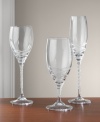 Bridal designer Vera Wang and Wedgwood's Blanc sur Blanc stemware features delicate ribbons of deeply etched crystal circling the stems and tapering rounded bowls for a more ethereal emulation of the white-on-white contrast of the elegant dinnerware pattern. Iced beverage shown in center.