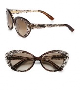 A 50's-inspired cat's-eye frame is accented by a beautiful lace detail. Available in brown with brown gradient lens.Logo temples100% UV protectionMade in Italy