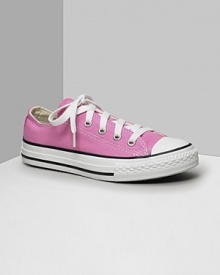Low cut Converse All Stars. This classic canvas sneaker set the standard in cool and comfort. Available in kids sizes. With lace-up canvas uppers, contrast stitching and rubber sole and toe. Low cut Converse All Stars. This classic canvas sneaker set the standard in cool and comfort. Available in kids sizes. With lace-up canvas uppers, contrast stitching and rubber sole and toe.