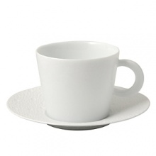 This collection was inspired by marine landscapes: the decorative pattern on the wide brimmed plates resembles the effervescent spray of ocean waves that crash and wash onto shore. The subtle effects on porcelain combined with skillful enameling techniques infuse Ecume with a contemporary yet poetic quality. The collection creates a highly elegant yet modern table setting. This collection was inspired by marine landscapes: the decorative pattern on the wide brimmed plates resembles the effervescent spray of ocean waves that crash and wash onto shore. The subtle effects on porcelain combined with skillful enameling techniques infuse Ecume with a contemporary yet poetic quality. The collection creates a highly elegant yet modern table setting.