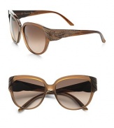 These runway-worthy, acetate frames are accented with delicate crystals on the end pieces, hinges and temples. Available in brown moto pearl with brown gradient lens. Crystal accented logo temples100% UV protectionMade in Italy 