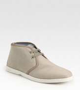 Classic lace-up style in cool canvas with an ankle-high profile and contrast sole.Canvas upperLeather liningPadded insoleRubber soleMade in Italy