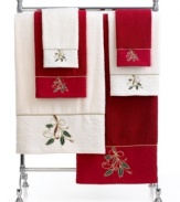 Ring in the holiday season in Lenox style. Featuring soft cotton embellished with festive holly-and-ribbon embroidery and tasteful touches of gold, this hand towel charms your bath with seasonal elegance.