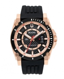 The world's most accurate watch: Precisionist by Bulova. Black ribbed silicone strap and round rose-gold tone stainless steel case. Black carbon fiber dial features rose-gold tone stick indices, date window at three o'clock, military time, luminous hour and minute hands, continually sweeping red second hand and logo. Quartz movement. Water resistant to 300 meters. Three-year limited warranty.