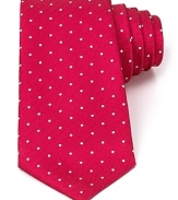 A brilliant design, from the strikingly rich color to the ingenious and unique craftsmanship of Turnbull & Asser, this classic tie features a polka dot pattern with a herringbone ground for a dynamic accent to your dress shirting.