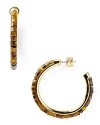 Follow your feline instincts and flaunt MICHAEL Michael Kors' tiger's eye hoops--the fierce stones lend exotic flair to staple tees or femme blouses.