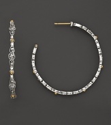 Intricately wrought designs, in sterling silver and 18K yellow gold, give these modern hoop earrings a hint of classical style. By Konstantino.