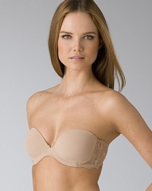 A strapless bra with molded cups and lace backing. Hook and eye closure. Comes with removable straps.