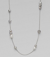From the Elements Collection. Luminous South Sea pearls and carved sterling silver beads are stationed on an elegant strand of sterling silver. Gorgeous worn either super long or doubled up.South Sea pearl Sterling silver Length, about 48 Lobster Clasp Imported