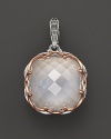 Sterling silver and 18K. pink gold frame a faceted doublet of clear quartz over chalcedony. By Tacori.