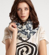 A classic style with a pretty twist in luxurious silk and wool. 50% silk/50% woolAbout 40 X 80Dry cleanImported 