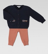 A nod to classic style, this lightweight button-down with front pockets and signature detailing is the perfect essential piece.CrewneckLong sleevesFront buttonsFront pockets with signature web trim and GG heart detailCottonDry cleanMade in Italy Please note: Number of buttons may vary depending on size ordered. 
