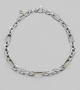 A stunning combination of cabled and smooth, oval and round links in sterling silver, with occasional links of 18k yellow gold. Sterling silver and 18k yellow gold Length, about 16 Lobster clasp Made in USA