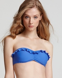 Refresh your poolside portfolio with Shoshanna's solid bikini top. Ruffle detailing lends this versatile piece playful allure while you bask. Refresh your poolside portfolio with Shoshanna's solid bikini top. Ruffle detailing lends this versatile piece playful allure while you bask.