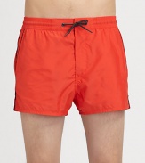 Versatile swimwear made for plenty of fun at the beach and beyond in quick-drying nylon.Elastic drawstring waistSide slash, back welt pocketsInseam, about 4PolyesterMachine washImported