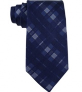 Hidden treasure. One of these vibrant plaid ties from Calvin Klein will be the crown jewel of your closet.