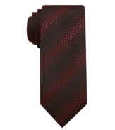 Classy style. Classy tie. Classy guy. It's all circular, especially when you're wearing this dotted skinny tie from Alfani.