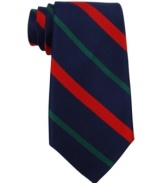 Tommy Hilfiger elevates a sporty look to a sophisticated new standard with this striped silk tie.