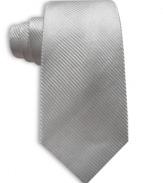 Simple and classic, you can never go wrong with a solid Perry Ellis silk tie.