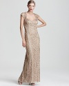 Elaborately detailed, this glamorous Sue Wong gown features a flattering sweetheart neckline and demure cap sleeves.