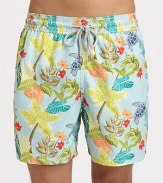 A colorful tropical print adorns these quick-dry trunks, complete with drawstring waist and back eyelets to avoid a ballooning effect.Drawstring elastic waistBack flap pocket with grip-tape closureMesh liningPolyamideMachine washImported