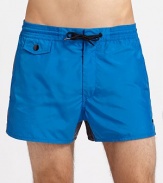 Classic fit, two-toned color trunks in quick-dry nylon.Elastic drawstring waistFront flap and back welt pocketsPolyesterMachine washImported