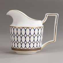 Embellished with intricate garlands, oval links and a fanciful dragon motif, this Wedgwood dinnerware evokes Europe's glorious Renaissance period. Rendered in deep blue and gold to transform any formal meal into a spectacular royal gala. Embellished with intricate garlands, oval links and a fanciful dragon motif, this Wedgwood dinnerware evokes Europe's glorious Renaissance period. Rendered in deep blue and gold to transform any formal meal into a spectacular royal gala.