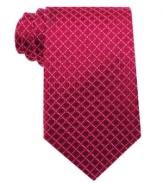 A subtly refined classic neats pattern stands out against a solid dress shirt for that perfectly put together look courtesy of Tasso Elba.