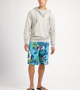 Classic swim trunk style comes to life in a bright floral print pattern, with side pocket detail in quick-drying nylon.Drawstring tie waistInseam, about 10Fully linedPolyesterMachine washImported