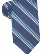 Skinny stripes bulk up your business style with this silk tie from Perry Ellis.