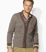 Accented with rugged utility details with luxurious leather patches, this French terry fleece cardigan blends heritage style with casual comfort.