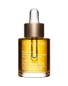 Natural astringent for Oily or Combination Skin. 100% pure plant extracts. Zero preservatives. Clarins exclusive blend of Rosewood, Geranium and Lotus extracts purifies, tightens pores and refines the skin texture. Hazelnut Oil softens, soothes and seals in moisture to prevent fine lines. Non-staining. In the evening, after thorough cleansing and toning, apply a small amount to face and neck still damp with Toning Lotion, avoiding the eye contour. Gently dab face with a soft tissue to remove any excess product.