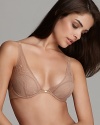 This lovely lace plunge style from Calvin Klein boasts everyday versatility. A wardrobe essential.