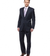 Keeps your wardrobe on the cutting edge with this slim-fit navy suit from Calvin Klein.