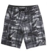 These O'Neill boardshorts mix classic plaid with edgy cameo for a hip surfer style.